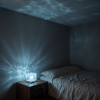 Aurora Cube water ripple lamp throwing blue rippling light across a bedroom ceiling and walls at night