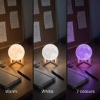 Luna 3D moon lamp shown in warm white, cool white and one of its seven colours