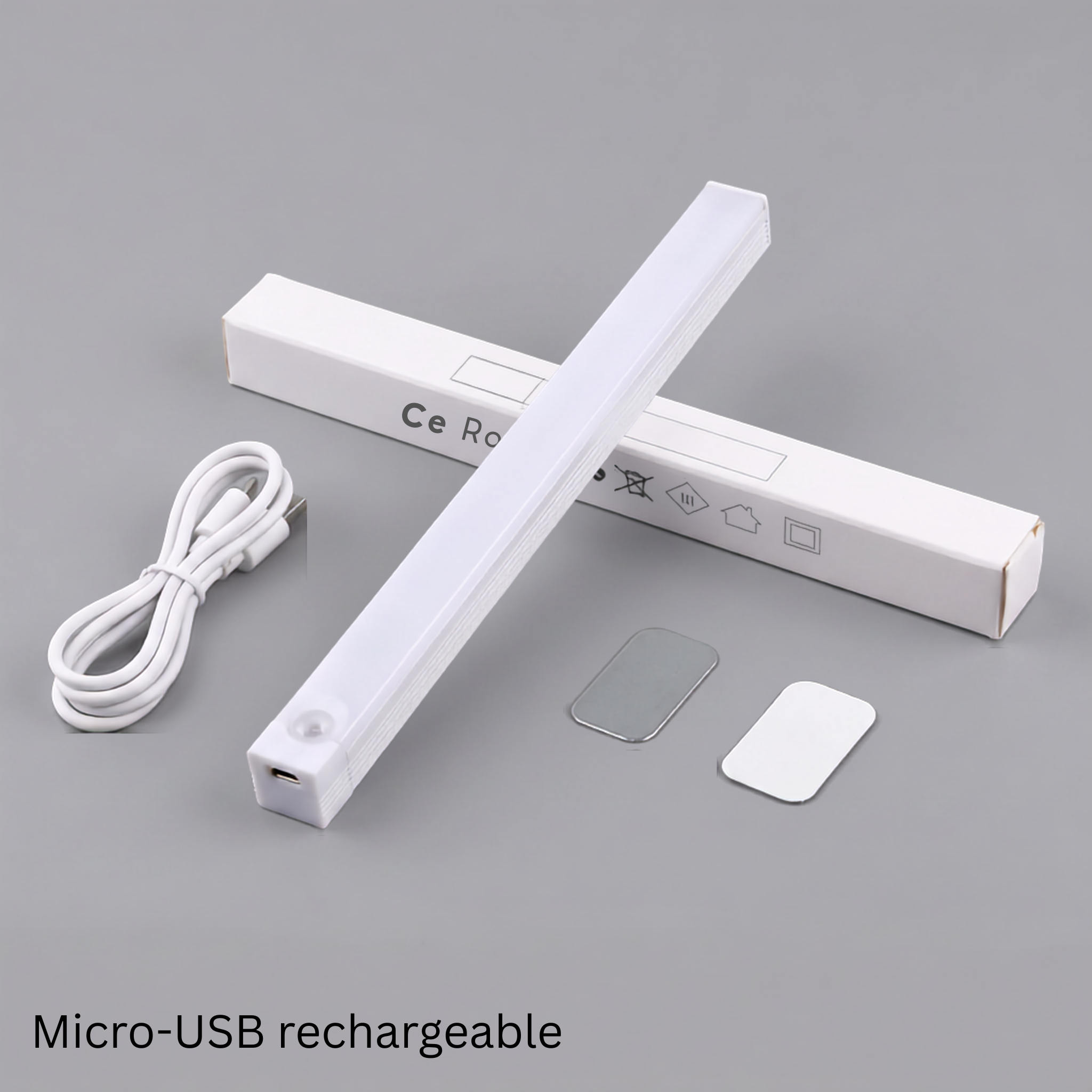 Nook Light bar with its micro-USB charging cable, magnetic strip and adhesive pad for mounting
